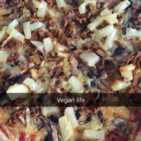 Hawaii with mushrooms and seitan-kebab meat instead of ham. at Etna Pizzeria in Gothenburg