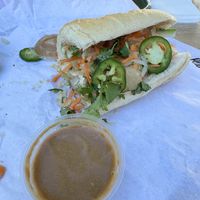 Half of a Tofu bahn mi with side of peanut sauce  at V-Roll Vietnamese Rolls & Bowls in Gulfport