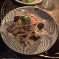 Gnocchi and (impossible, though it doesn’t say so) meatballs with shaved fennel, tomato and a tasty cream sauce. Fresh basil too .  at Charlie Was a Sinner in Philadelphia