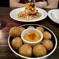 Fried Chicken in the back, Potato Croquettes in the front  at Charlie Was a Sinner in Philadelphia