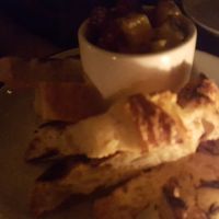 pickled beet jar with grilled sourdough and pine nut ricotta  at Charlie Was a Sinner in Philadelphia