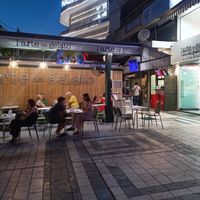 Seating area on the square at L'arte del Gelato in New York