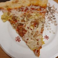 Delicious huge slice at Lazy Moon Pizza in Orlando