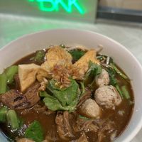 Fragrant soup with braised shiitake stems, paired with soft noodles – simple, hearty, and deeply satisfying.  at So Vegan - Phoenix Pratunam in Bangkok