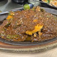 Sambal fish on hot plate at Nature Vegetarian Delights (NVD) Restaurant in Northeast Singapore