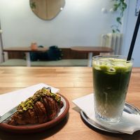 Pistachio croissant and matcha lattee  at Müz Botanik & Coffee in Istanbul