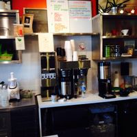 Menu board and prep area at PRESS in Washington