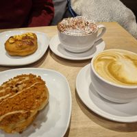Honeycomb doughnut with a hot chocolate. Biscoff doughnut with a soy latte. at Considerit in Edinburgh