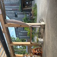 Outside patio with inside restaurant at the background   at Sylvan Table in Michigan