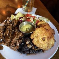 Mushroom and plantain bowl with black beans, rice, and delicious avocado salsa   at Low Tide Lounge in Portland