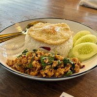 Pad Krapao (stir fried holy basil with ground “pork” and a fried “egg”)  at Mello in Bangkok