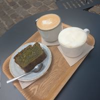 Latte with banana milk, cappuccino with soy milk and vegan pistachio cake at Latte Coffee in Hauts-de-france