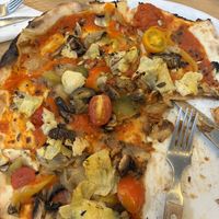 Pizza with seasonal vegetables   at Restaurant Il Donka Millo La teste in Nouvelle-aquitaine