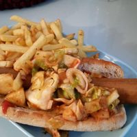 Smoky sausage role with the hot relish. And French Fries.  at Astrid och Aporna - Astrid og Aberne in Copenhagen