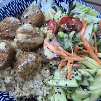 Falafel salad with tahini dressingg  at Fifty Parallel Tap and Grill in Campbell River