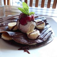 Banana Maple Sirup Pancake with Raspberry Jam, Bananas, Chocolate-Maca Sauce und Vanilla Icecream 🙂 at The Seeds of Life in Ubud