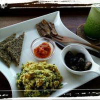 Classic breakfast - scrambled 'eggs', aubergine bacon, raw bread, marinates mushrooms, salsa. at The Seeds of Life in Ubud