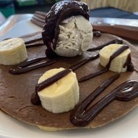 Banana and activated walnut pancakes. Not of the soft and fluffy variety but really yummy and light   at The Seeds of Life in Ubud