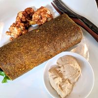 ";Egg and bacon"; burrito with buffalo wings. Amazing. at The Seeds of Life in Ubud