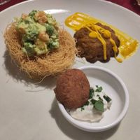 Falafel in salsa tzaziki, nido di pasta fritta, tortino di tompinambur at La Locanda Del Gusto in Vicenza