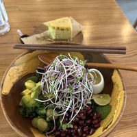 Falafel Salad + half-eaten passionfruit cheesecake😄 at 2 Roots Plant-Based Café in Ho Chi Minh City