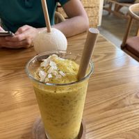 Passion fruit smoothie and fresh coconutt  at 2 Roots Plant-Based Café in Ho Chi Minh City