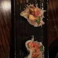 Tofu seasame crackers topped with finger lime   at Lost in Asia in Hobart