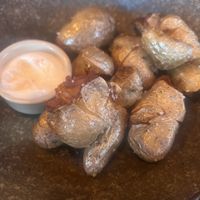 Smashed potatoes with vegan mayo   at Lost in Asia in Hobart