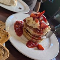 Vegan strawberry cheesecake pancake stack at Cherry Reds Cafe and Bar in Birmingham