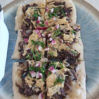 Hibiscus steak like pizza at We Have Been Here Before in St Georges