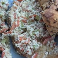 This is what their “veggie tofu” cream cheese was like … crumbled tofu and veggies making the bagel soggy.  at Bagels & Co. in Tallahassee