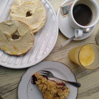 Hummus bagel, plum crumble, coffee, orange juice at Zoe Food in Gran Canaria