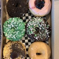 Half dozen vegan donuts to go at Glam Doll Donuts - Eat Street in Minneapolis