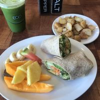 Custom juice, home potatoes, breakfast wrap at Under the Bodhi Tree in Pahoa