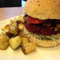 Pesto mushroom burger with adzuki bean patty. I mean just look at those sad dry home cut fries. Needs more flavor and sauce.  at Ooh Cha Cha - Zhongzheng District in Taipei