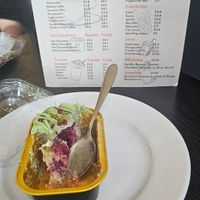 Pistachio and raspberry loaf vegan and gluten free! at Roma Cafe & Lounge in England