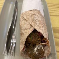 Falafel wrap w lemon coriander hummus and all the veggies  at The Cheeky Pea in Kingston Upon Thames