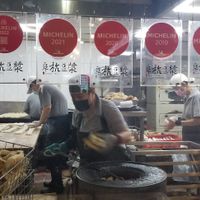 Baking the bread at Fuhang Soymilk in Taipei