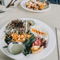 Mjadra plate and Tawook chicken plate at Nuba Cafe - Yaletown in Vancouver