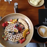 Vegane Cashew Waffel und Cappuccino mit Haferdrink at Konvent Café, Bäckerei, Kaffeerösterei am Dom in Luebeck