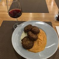 House-made vegan meatballs with sweet potato purée and basmati rice   at Bistro Paris in Primorsko-goranska županija