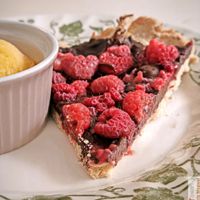 chocolate and raspberry tart with mango ice cream at Chat-Rivari Café in Paris