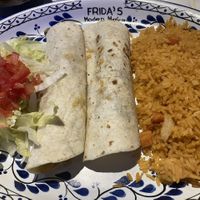 Potato enchiladas with the cheese sauce, and sour cream removed at Frida's Modern Mexican in Athens