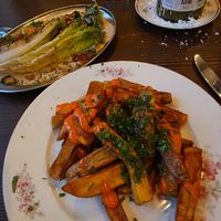 Fired potatoes and grilled romaine at Marumba in Budapest