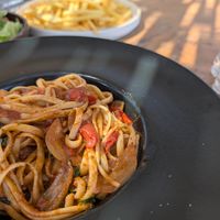 Tomato and basil linguini with portion of fries at The Boulevard sea.food.wine in New Jersey