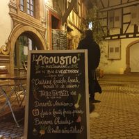 Sign outside at L'Acoustic in Selestat
