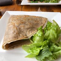 Filled with fall veggies like butternut squash and Brussel sprouts. So good! at Starving Artist Creperie and Cafe in Lee