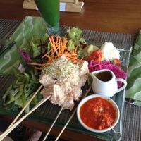 Tempe satay w/ Spicy peanut sauce and 'sautéed' Greens at Divine Earth in Seminyak