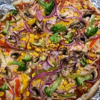 Build your own pizza with vegan cheese at Woodstone Pizza & Flamegrill Keswick in England