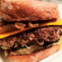 Impossible Lounge Burger with vegan cheese and carmelized onions at Burger Lounge in Roseville